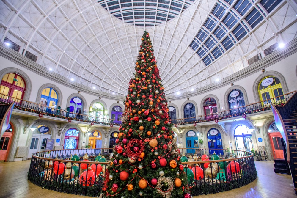 Large-scale Christmas Tree designed by Fizzco Projects at Leeds Corn Exchange Shopping Centre for the Christmas season.