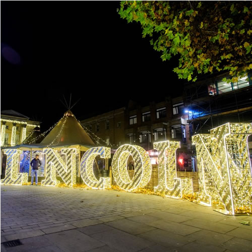 Light-up Lincoln selfie-point by Fizzco Projects displayed in Lincoln City Centre's Cornhill Quarter for the Christmas period.