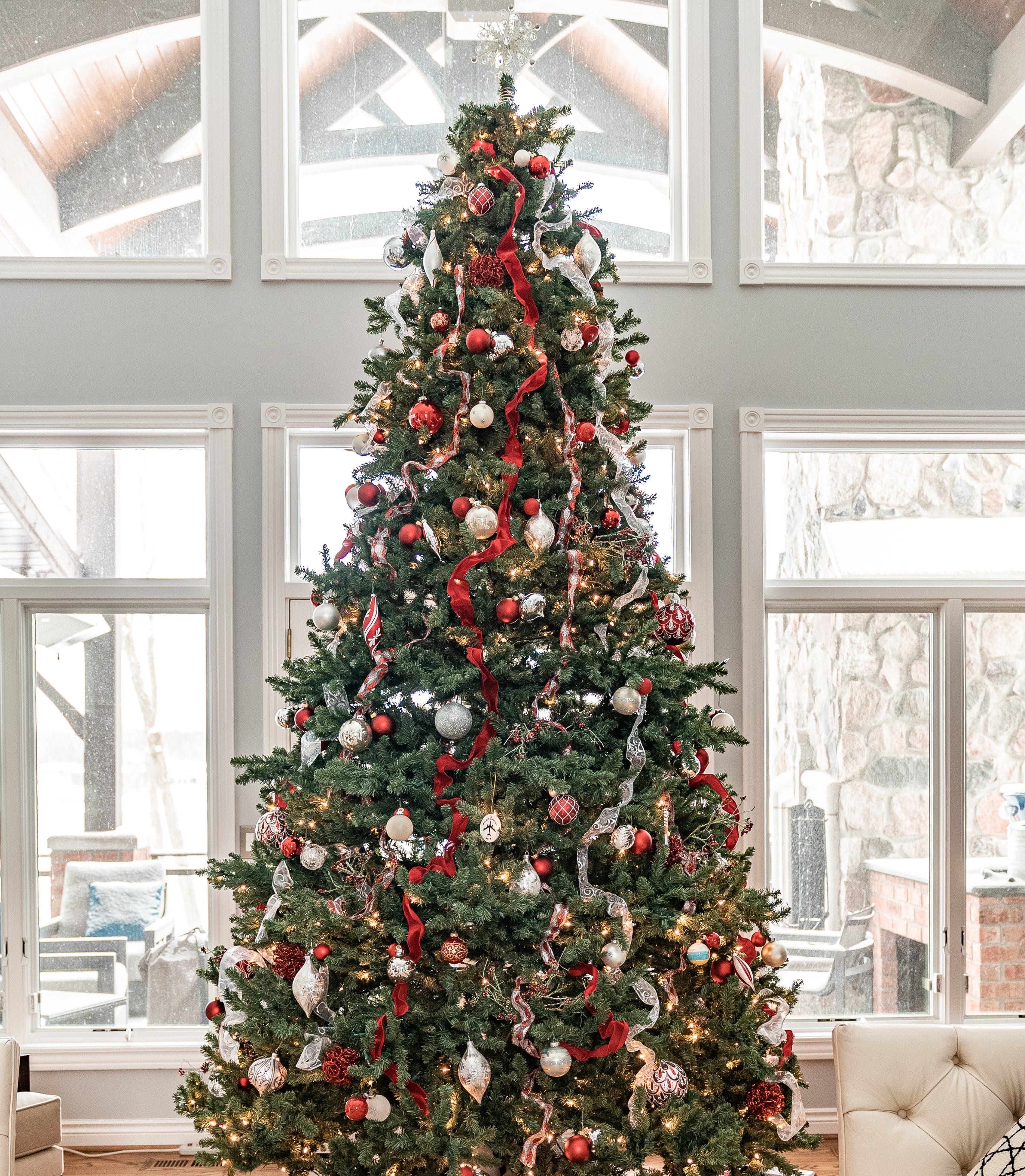 A Christmas Tree decorated with a classic and traditional look.