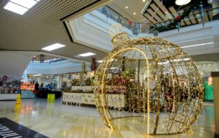 Light-up gold bauble motif displayed at The Galleries Shopping Centre in Bristol.